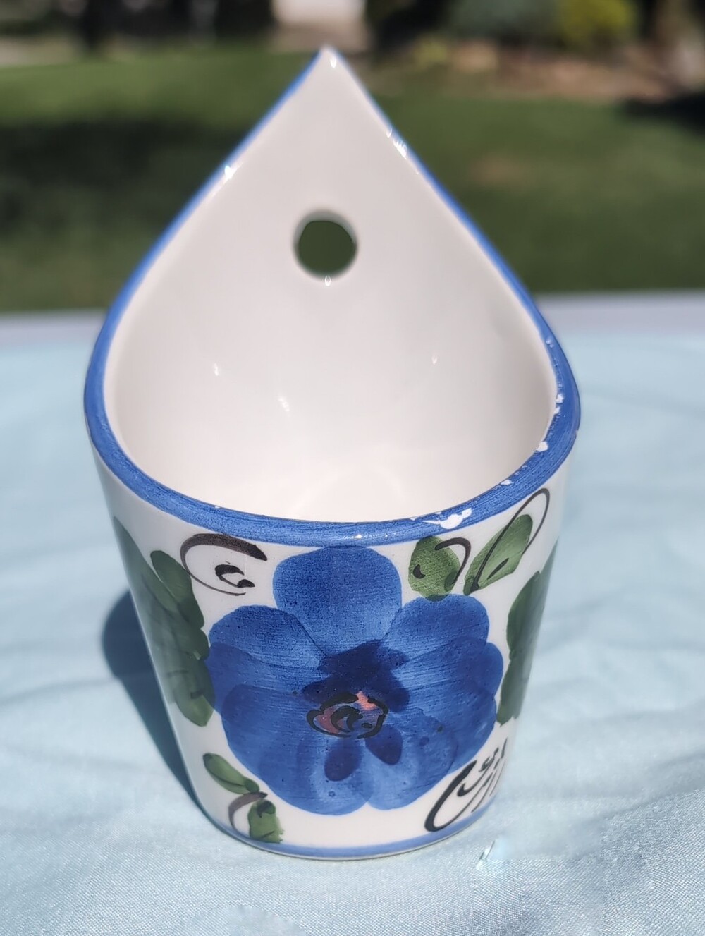 Ceramic Wall Pocket With Hand-Painted Blue Floral Motif/Green Leaves.